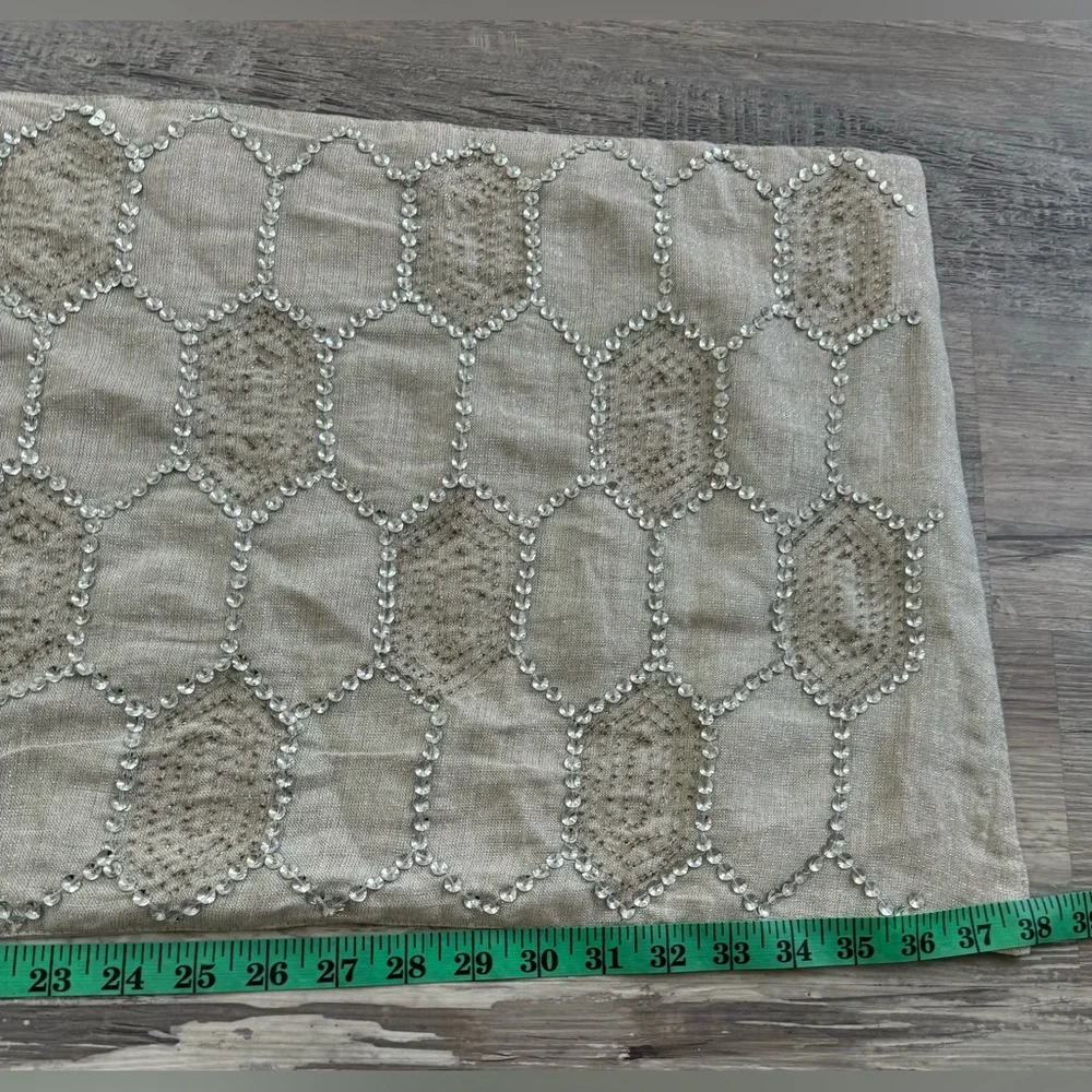 Pier 1 Imports taupe table runner with embroidered hexagon pattern